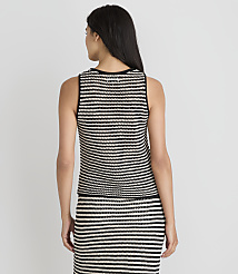 A woman in a striped tank top and skirt stands against a plain white background. carousel Product Image 3