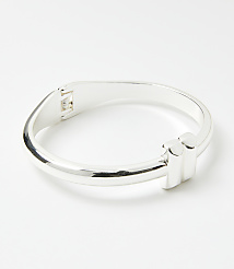 A silver bracelet with a modern design sits on a plain white background. carousel Product Image 1