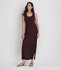 A woman in a maroon maxi dress stands against a plain white background. carousel Product Image 1