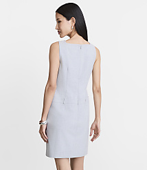 A woman in a light gray dress stands against a plain white background. carousel Product Image 3