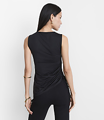 A woman in a black sleeveless top and pants stands against a plain white background. carousel Product Image 3