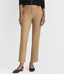 A person stands in the foreground wearing tan pants and black flats, against a plain white background. carousel Product Image 2