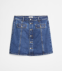 A blue denim A-line skirt with a button-down front and two chest pockets is displayed against a plain white background. carousel Product Image 4