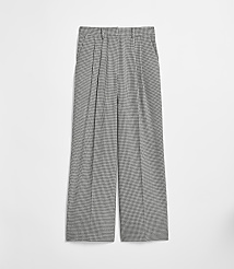 Pleated, wide-leg trousers with a subtle checkered pattern are laid flat against a plain white background. carousel Product Image 5