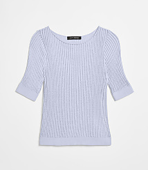 A light blue ribbed knit sweater with short sleeves is laid flat against a plain white background. carousel Product Image 5