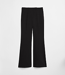 Black flared trousers with a white background. carousel Product Image 5