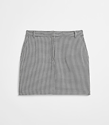 A grey and white houndstooth mini skirt lies flat against a plain white background. carousel Product Image 5