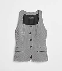 A sleeveless houndstooth vest with black buttons and a black lining is displayed against a plain white background. carousel Product Image 5
