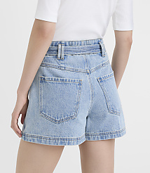 A person wearing light-wash denim shorts with a white belt stands against a plain white background. carousel Product Image 2