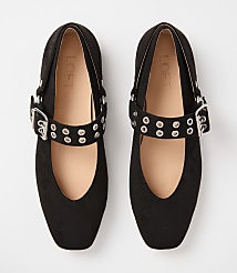 A pair of black suede Mary Jane flats with silver buckle straps and grommets rests on a plain white background. carousel Product Image 3