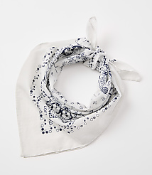 A white bandana with a blue paisley pattern is tied in a knot against a plain white background. carousel Product Image 1