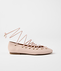 A pale pink ballet flat with long, crisscrossing laces is presented against a plain white background. carousel Product Image 1