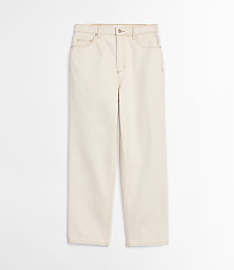 A pair of cream-colored jeans with visible stitching lies flat against a plain white background. carousel Product Image 4