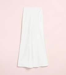 A white, flowing skirt hangs against a soft pink background. carousel Product Image 4