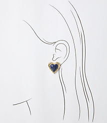 A gold heart-shaped earring with a blue stone is worn on a sketched ear against a white background. carousel Product Image 2