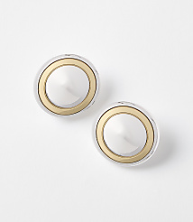 Two silver and gold circular earrings rest on a plain white background. carousel Product Image 1