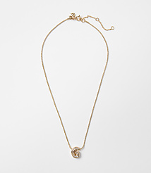 A delicate gold necklace with a "G" charm hangs against a plain white background. carousel Product Image 1