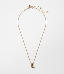 A delicate gold chain necklace with an "L" initial pendant hangs against a plain white background. carousel Product Image 1
