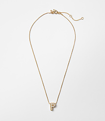 A delicate gold necklace with a letter "P" pendant hangs against a plain white background. carousel Product Image 1