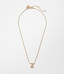 A delicate rose gold necklace with a letter "Z" pendant rests on a plain white background. carousel Product Image 1