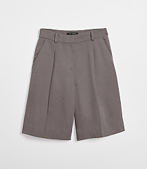 A pair of taupe culottes with pleats and pockets are laid flat against a plain white background. carousel Product Image 5