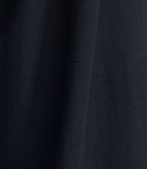 Dark, textured fabric folds in the foreground against a similarly dark, indistinct background. carousel Product Image 3
