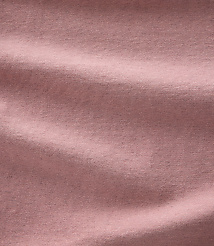 Soft, dusty rose fabric with gentle folds and shadows fills the frame. carousel Product Image 4