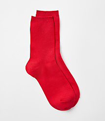 Two bright red socks are laid out against a plain white background. carousel Product Image 1