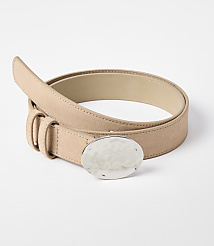 A beige suede belt with a hammered silver oval buckle rests on a plain white background. carousel Product Image 1