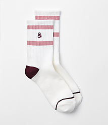 A pair of white crew socks with pink stripes and maroon heels are laid out against a plain white background. carousel Product Image 1