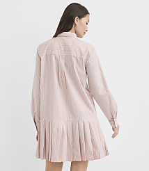 A woman in a pink pinstripe dress stands against a plain white background. carousel Product Image 3