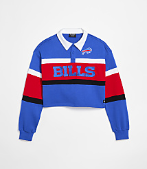 A cropped blue, red, and white striped rugby shirt with "BILLS" embroidered across the chest is displayed against a plain white background. carousel Product Image 1