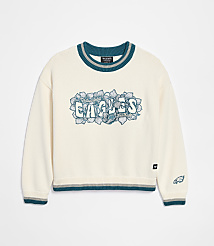 A cream-colored sweater with "Philadelphia Eagles" emblazoned across the chest in teal and gray lettering is displayed against a plain white background. carousel Product Image 1