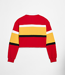 A red, yellow, and white striped cropped rugby shirt is displayed against a plain white background. carousel Product Image 2