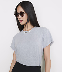 A woman in a grey t-shirt and sunglasses poses against a plain white background. carousel Product Image 2