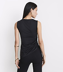 A woman in a black sleeveless top and pants stands against a plain white background. carousel Product Image 3
