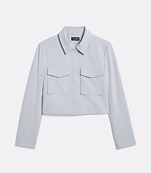 A light blue cropped jacket with two chest pockets is displayed against a plain white background. carousel Product Image 5