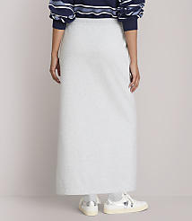 A person wearing a light gray maxi skirt and a striped sweater stands against a plain background. carousel Product Image 3