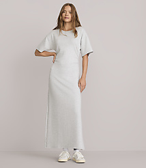 A woman in a light gray maxi t-shirt dress stands against a plain white background. carousel Product Image 2