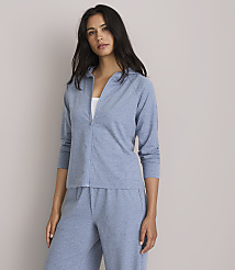 A woman in a blue hooded jacket and pants stands against a plain gray background. carousel Product Image 2