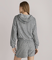 A woman in a sparkly grey hoodie and shorts stands against a plain white background. carousel Product Image 3