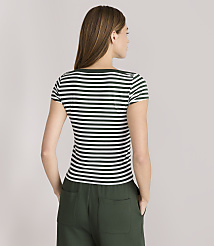 A woman in a striped t-shirt and green pants stands against a plain gray background. carousel Product Image 3