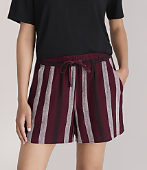 A person in a black t-shirt and striped burgundy shorts stands against a plain white background. carousel Product Image 2