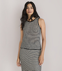 A woman in a striped top and skirt stands against a plain white background. carousel Product Image 1