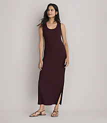 A woman in a maroon maxi dress stands against a plain white background. carousel Product Image 1