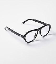 Black-rimmed glasses with clear lenses rest on a plain white surface. carousel Product Image 1