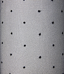 Black polka dots are scattered across a textured, light gray fabric background. carousel Product Image 2