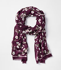 A burgundy floral scarf with frayed edges is laid out against a plain white background. carousel Product Image 1