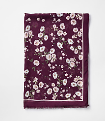 A burgundy scarf with a delicate floral pattern of white and pink flowers is laid flat against a plain white background. carousel Product Image 2