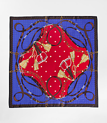 A red and white polka dot center is surrounded by a blue border with equestrian-themed motifs of stirrups, tassels, and belts. carousel Product Image 2